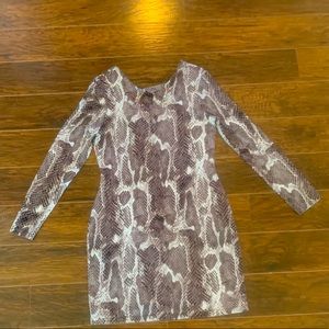 Snakeskin, Formfitting Jennifer Lopez Dress